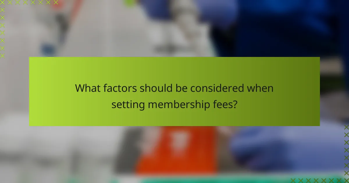 What factors should be considered when setting membership fees?
